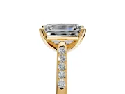 Solitaire Engagement Ring Setting for Emerald Cut Center with Channel Accents and Prong Head in Yellow Gold