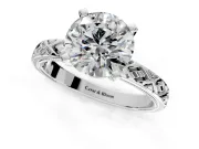Solitaire Engagement Ring Setting for Round Cut Center with Milgrain X Pattern Band and Prong Head in Sterling Silver