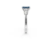 3 Stone Engagement Ring Setting for Fancy Blue Emerald Cut Center with Large Pear-Shaped Accents and Prong Head in Sterling Silver