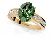 Solitaire Engagement Ring Setting for Fancy Green Oval Center with Princess Cut Channel Band and Prong Head in Yellow Gold