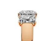3 Stone Engagement Ring Setting for Radiant Cut Center with Raised Basket Heads and Prong Head in Rose Gold