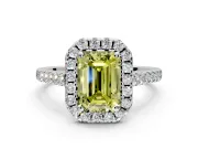 Halo Engagement Ring Setting for Fancy Yellow Emerald Cut Center with Narrowing Pave Band and Prong Head in Platinum