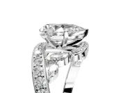 Solitaire Engagement Ring Setting for Pear-Shaped Center with Pave Bypass Twist Band and Prong Head in Platinum