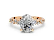 Solitaire Engagement Ring Setting for Oval Center with Trailing Leaf Accent Band and Prong Head in Rose Gold