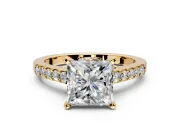 Solitaire Engagement Ring Setting for Princess Cut Center with Crossover Accents and Prong Head in Yellow Gold