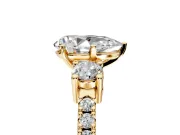 3 Stone Engagement Ring Setting for Pear-Shaped Center with Round Cut Side Accents and Prong Head in Yellow Gold