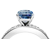 Solitaire Engagement Ring Setting for Fancy Blue Radiant Cut Center with Channel-Set Accents and Prong Head in Platinum