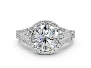 Halo Engagement Ring Setting for Round Cut Center with Pave Split Shank and Prong Head in White Gold