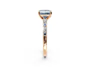 Baguette Engagement Ring Setting for Fancy Blue Princess Cut Center with Alternating Bar-Set Band and Prong Head in Rose Gold