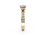 Solitaire Engagement Ring Setting for Fancy Blue Princess Cut Center with Channel-Set Accents and Prong Head in Yellow Gold