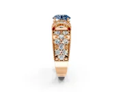 Pave Engagement Ring Setting for Fancy Blue Round Cut Center with Curved Accent Rows, Openwork and Prong Head in Rose Gold
