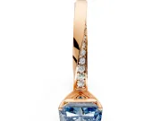 Side Accent Engagement Ring Setting for Fancy Blue Radiant Cut Center with Accent Shoulders and Prong Head in Rose Gold