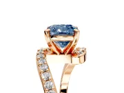 Solitaire Engagement Ring Setting for Fancy Blue Cushion Cut Center with Pave Bypass Swirl Band and Prong Head in Rose Gold
