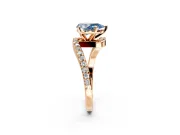 Solitaire Engagement Ring Setting for Fancy Blue Pear-Shaped Center with Pave Bypass Swirl Band and Prong Head in Rose Gold