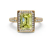 Halo Engagement Ring Setting for Fancy Yellow Emerald Cut Center with Metal-Rimmed Halo, Pave Band and Prong Head in Yellow Gold