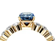 Shared-Prong Engagement Ring Setting for Fancy Blue Emerald Cut Center with Graduated Accents and Prong Head in Yellow Gold
