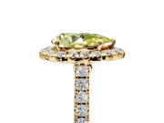 Halo Engagement Ring Setting for Fancy Yellow Pear-Shaped Center with Narrowing Pave Band and Prong Head in Yellow Gold