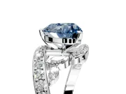 Solitaire Engagement Ring Setting for Fancy Blue Heart-Shaped Center with Pave Bypass Twist Band and Prong Head in Platinum