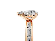 Solitaire Engagement Ring Setting for Pear-Shaped Center with Channel Baguette Band and Prong Head in Rose Gold