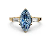 3 Stone Engagement Ring Setting for Fancy Blue Marquise Center with Channel Baguette Accents and Prong Head in Yellow Gold