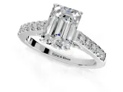 Solitaire Engagement Ring Setting for Emerald Cut Center with Crossover Accents and Prong Head in Platinum