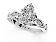 Solitaire Engagement Ring Setting for Pear-Shaped Center with Marquise and Bezel Accents and Prong Head in Platinum