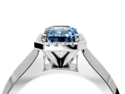 Halo Engagement Ring Setting for Fancy Blue Emerald Cut Center with Knife Ridge Cathedral Band and Prong Head in White Gold