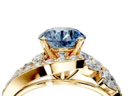 Halo Engagement Ring Setting for Fancy Blue Round Cut Center with Marquise and Pave Bypass Band and Prong Head in Yellow Gold