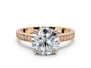 Solitaire Engagement Ring Setting for Round Cut Center with Channel-Set Accent Band and Prong Head in Rose Gold