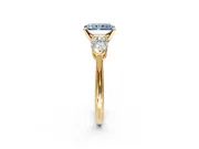 3 Stone Engagement Ring Setting for Fancy Blue Radiant Cut Center with Large Pear-Shaped Accents and Prong Head in Yellow Gold