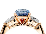 3 Stone Engagement Ring Setting for Fancy Blue Radiant Cut Center with Large Pear-Shaped Accents and Prong Head in Rose Gold