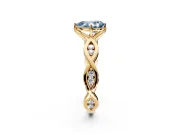 Solitaire Engagement Ring Setting for Fancy Blue Pear-Shaped Center with Accented Twist Band and Leaf Prong Head in Yellow Gold