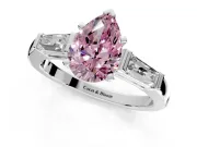 3 Stone Engagement Ring Setting for Fancy Pink Pear-Shaped Center with Tapered Baguettes, Plain Band and Prong Head in Sterling Silver