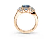3 Stone Engagement Ring Setting for Fancy Blue Princess Cut Center with Raised Basket Heads and Prong Head in Rose Gold