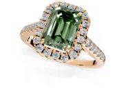 Halo Engagement Ring Setting for Fancy Green Emerald Cut Center with Narrowing Pave Band and Prong Head in Rose Gold