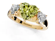 3 Stone Engagement Ring Setting for Fancy Yellow Heart-Shaped Center with Raised Basket Heads and Prong Head in Yellow Gold