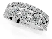Round Cut Lab-Grown Diamond Infinity Twist Wedding Band with Pave Border Rows and Prong Setting in Platinum