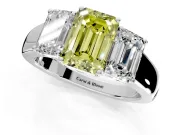 3 Stone Engagement Ring Setting for Fancy Yellow Emerald Cut Center with Raised Basket Heads and Prong Head in Platinum