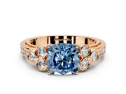 Cluster Engagement Ring Setting for Fancy Blue Cushion Cut Center with Bezel Accent Clusters and Prong Head in Rose Gold