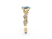 Solitaire Engagement Ring Setting for Fancy Blue Pear-Shaped Center with Bar-Station Pave Twist and Prong Head in Yellow Gold