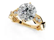 Solitaire Engagement Ring Setting for Round Cut Center with Accented Twist Band and Leaf Prong Head in Yellow Gold