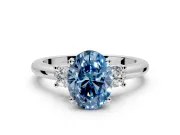 3 Stone Engagement Ring Setting for Fancy Blue Oval Center with Wide Plain Band and Prong Head in Platinum
