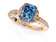 Floral Engagement Ring Setting for Fancy Blue Radiant Cut Center with Four Accent Clusters and Prong Head in Rose Gold