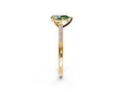 Solitaire Engagement Ring Setting for Fancy Green Pear-Shaped Center with Channel Accents and Prong Head in Yellow Gold