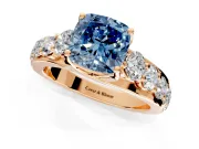 Solitaire Engagement Ring Setting for Fancy Blue Cushion Cut Center with Graduated Shared Prongs and Prong Head in Rose Gold