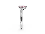 3 Stone Engagement Ring Setting for Fancy Pink Pear-Shaped Center with Channel Baguette Accents and Prong Head in Platinum
