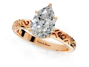 Solitaire Engagement Ring Setting for Pear-Shaped Center with Scrollwork Band and Prong Head in Rose Gold