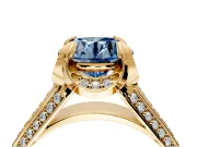 Solitaire Engagement Ring Setting for Fancy Blue Round Cut Center with Accented Split Shank and Prong Head in Yellow Gold