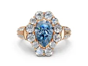 Large Accent Halo Engagement Ring Setting for Fancy Blue Pear-Shaped Center with Pave Split Shank and Prong Head in Rose Gold