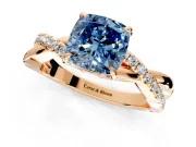 Crossover Engagement Ring Setting for Fancy Blue Cushion Cut Center with Pave and Plain Strands and Prong Head in Rose Gold